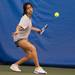 Sanika Kulkarni of Pioneer girls tennis team returns the ball  during practice Thursday night.
Courtney Sacco I AnnArbor.com 